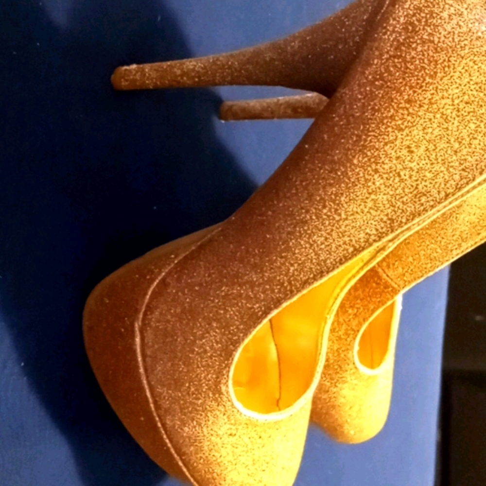 Gold glitter high heels